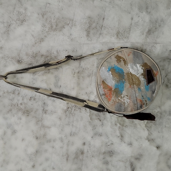 Canvas round crossbody purse. Has splashes of color. - Picture 3 of 10